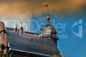 Detail of a house view with weather vane