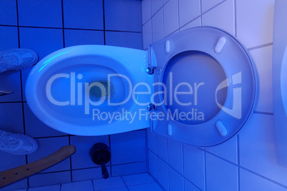 Toilet with blue UV light, black light