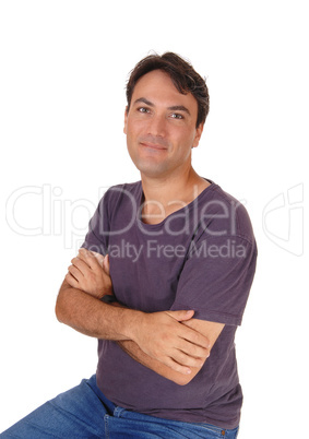 Portrait of smiling handsome man sitting