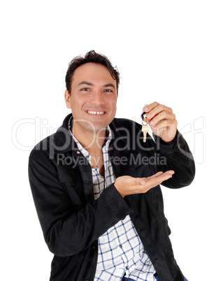 Happy man holding the key's to his new house