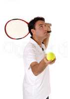 Man playing tennis looking up