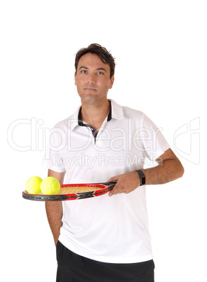 A man tennis player holding the racket and balls