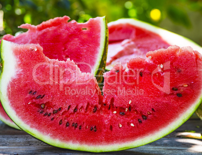 slice of ripe red watermelon with seeds