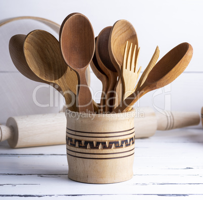 various wooden objects in a wooden jar