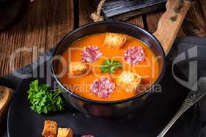 Hungarian paprika cream soup with spicy sausage