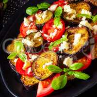 Eggplant grilled with aromatic feta cheese and tomatoes