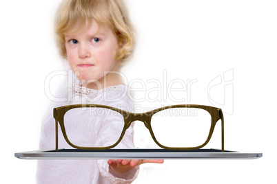 Child with tablet computer and glasses