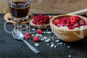 Tasty breakfast with cottage cheese, raspberries and cup of coffee.