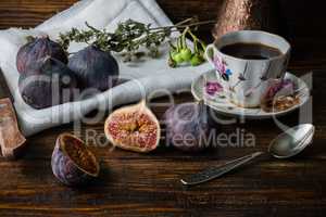 Cup of coffee with juicy figs for dessert