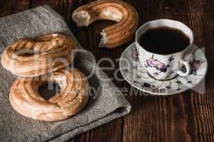 Still Life with Two Eclairs and Cup of Coffee