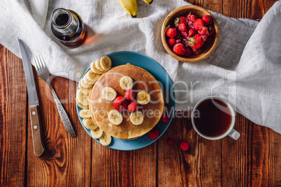 Breakfast with Homemade Pancakes and Fruits.