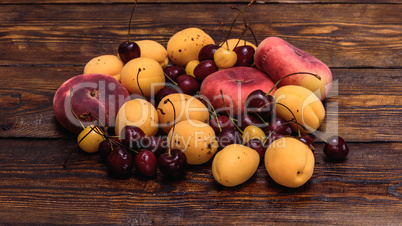 Fruits on dark wooden background