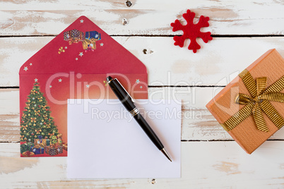 Christmas letter over a rustic wooden table