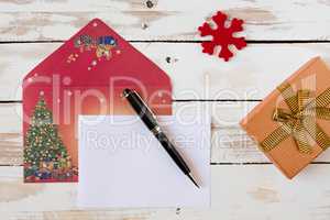 Christmas letter over a rustic wooden table