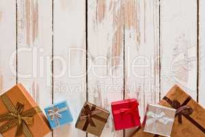 Christmas presents over a rustic wooden table
