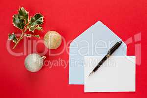 Christmas letter over a red background