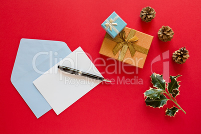 Christmas letter over a red background