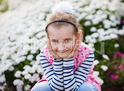 Girl on flowers background