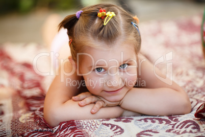 Child resting outdoors