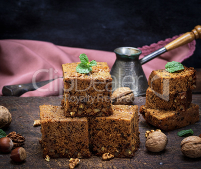 baked square slices of pie with walnuts