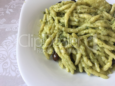 Italian trofie pasta with traditional pesto sauce