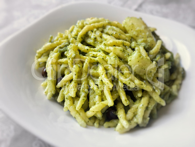 Italian trofie pasta with traditional pesto sauce