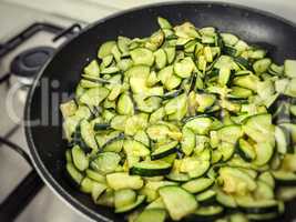 cooking zucchini in a frying pan