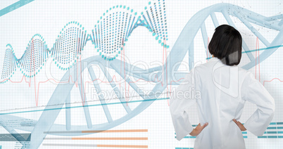 Composite image of doctor standing with hands on hip against white background