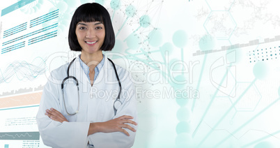 Composite image of doctor standing with arms crossed against grey background