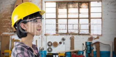 Composite image of female architect wearing hard hat and safety glasses against white background