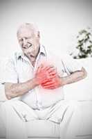 Composite image of aged man suffering with heart pain