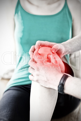 Composite image of emerging man doing fitness exercises with a woman