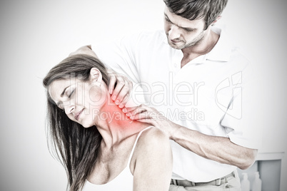 Composite image of male chiropractor massaging a young womans neck
