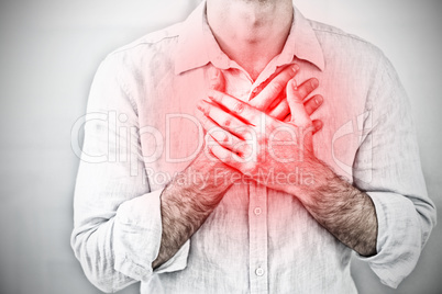 Composite image of mid section of a man with chest pain