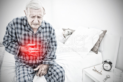 Composite image of aged man suffering with belly pain