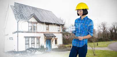 Composite image of female architect looking at clipboard against grey background