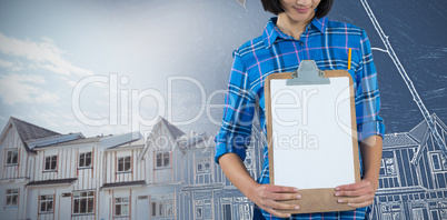 Composite image of architect holding clipboard against grey background