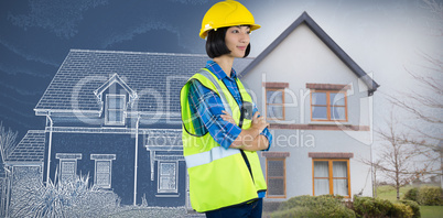 Composite image of female architect standing with arms crossed against grey background