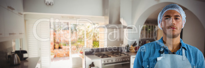 Composite image of male waiter standing