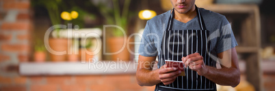 Composite image of male waiter taking order