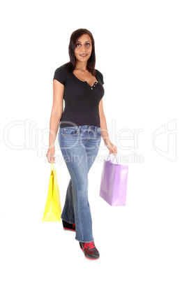 Woman walking with her shopping bags