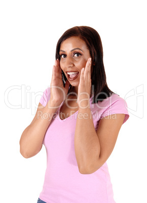 Happy woman holding her hands on face