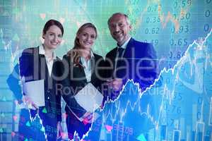 Composite image of smiling colleagues standing against white background