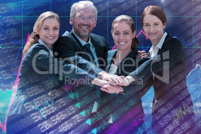 Composite image of portrait of happy business people huddling hands against white background