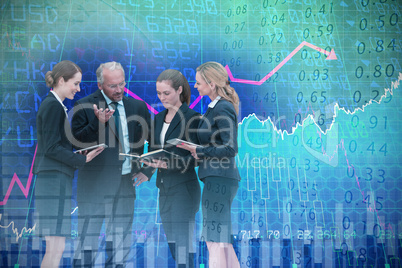 Composite image of businessman explaining to female colleagues against white background