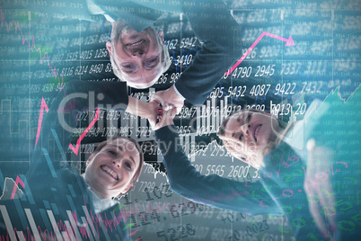 Composite image of low angle portrait of business people holding hands against white background