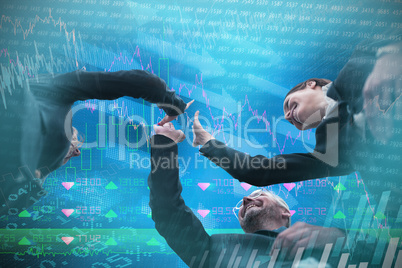 Composite image of low angle view of business people giving high five