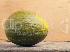 Fresh melon on wooden table