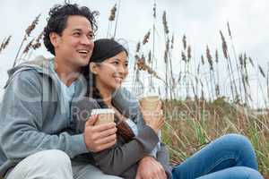 Asian Man Woman Romantic Couple Drinking Takeout Coffee on Beach