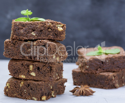 pieces of chocolate brownie pie with walnuts